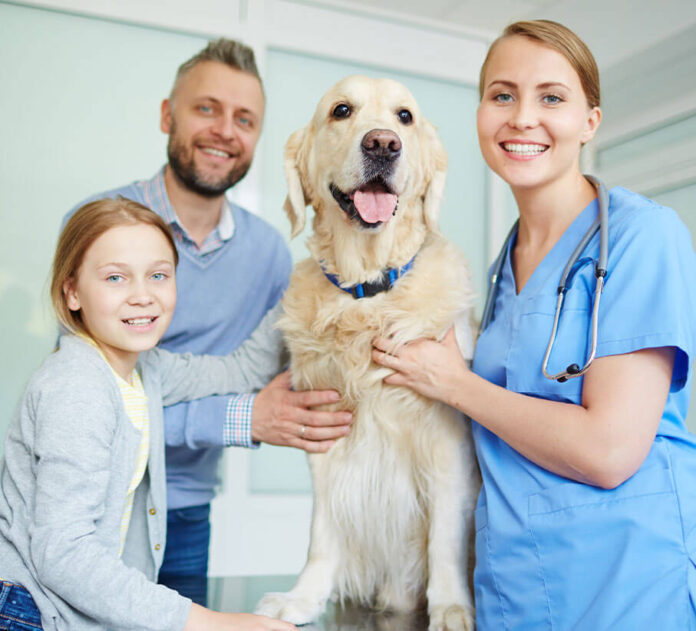 Smiling family with dog 1